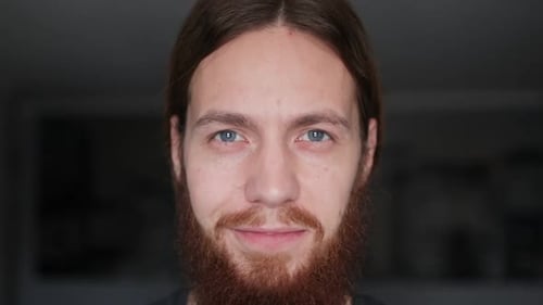 Close Up of Bearded Young Adult Smiling