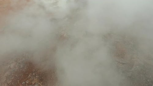 Hiker Walks Through Geothermal Landscape, Aerial View