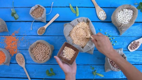 Legumes and Beans Arranged on Blue Surface