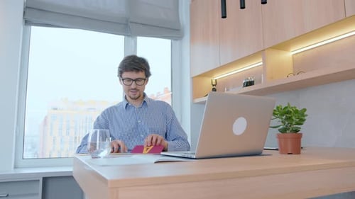 Man Teaching Alphabet via Video Call