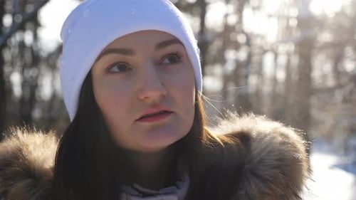 Portrait of Attractive Woman Walking and Admiring Beautiful Winter Landscapes
