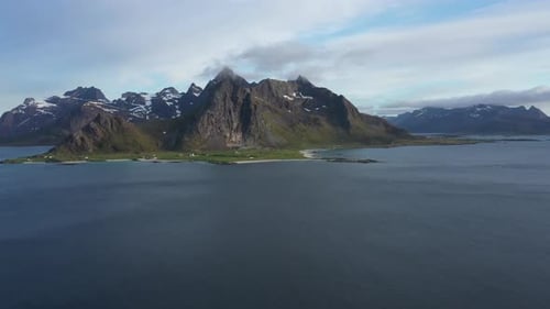 Majestic Mountains Meet Ocean in Scenic Landscape