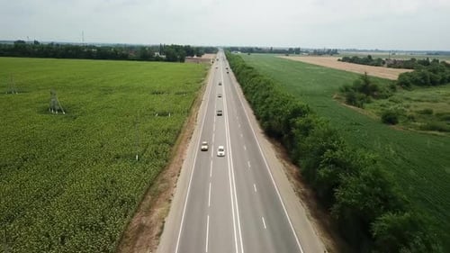 Aerial Fly Over Motorway, Freeway Traffic - Trucks and Cars on the Road