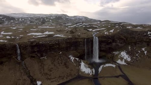 Seljalandsfoss waterfall in Iceland aerial panoramic view at sunrise