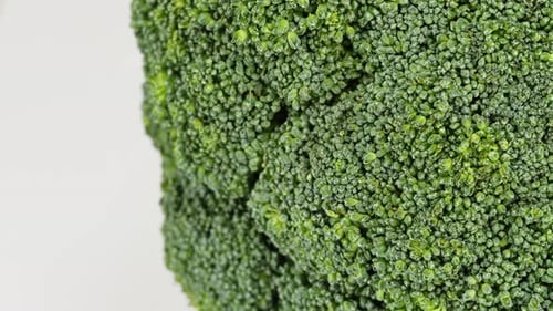 Broccoli Top View Rotating Fresh Green Broccoli on White Background Closeup Vitamins Raw Food and