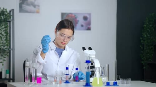 Woman Scientist Working in a Lab