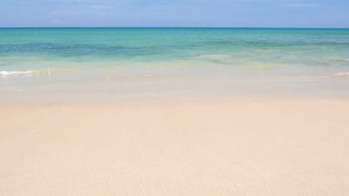 Beautiful tropical beach sea ocean with blue sky and white cloud