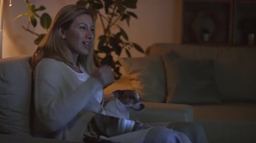 Woman Watching Action Movie at Home