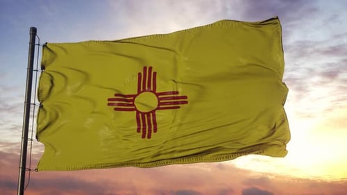 New Mexico State Flag Waving at Sunset