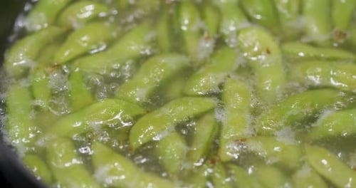 Edamame Pods Boiling in Water, Close Up