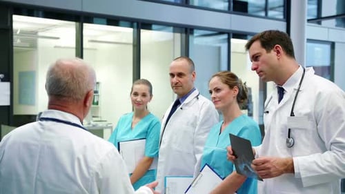 Medical Team Discussing X-Ray in Modern Hospital