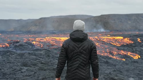 Man Watches Active Volcano Lava Flow in Iceland