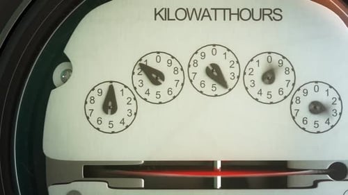 Analog electricity meter showing household consumption in kilowatt hours.