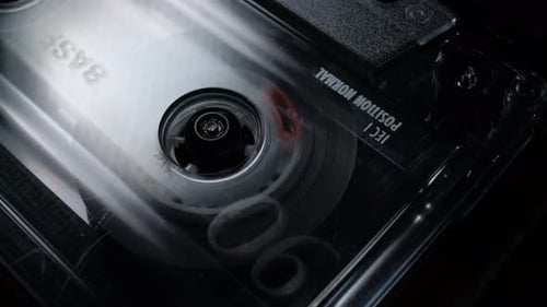 Audio Cassette Tape Spinning in Macro Shot