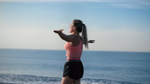 Fitness Female Practicing Yoga Pose Meditation at Sunrise Coast