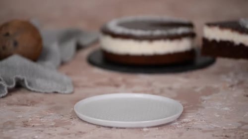 Chocolate Coconut Cake Slice Being Served