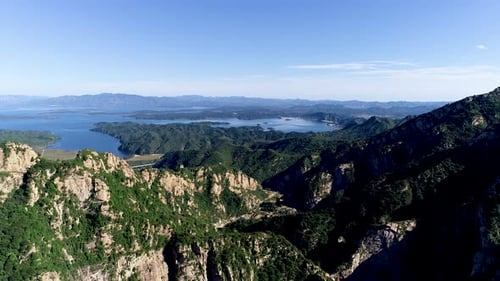 Aerial View of Mountain with Water Reservoir on the Background with Beautiful Blue Sky