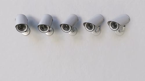 Five Security Cameras Panning and Monitoring on White Wall
