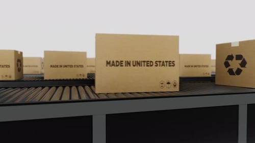 Cardboard Boxes on Conveyor Belt with Made in USA Label