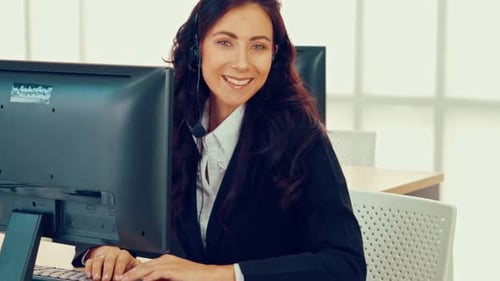 Business People Wearing Headset Working in Office