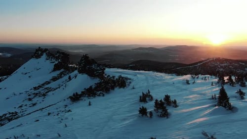 Mountains with Snowy Slopes and Pines at Famous Ski Resort
