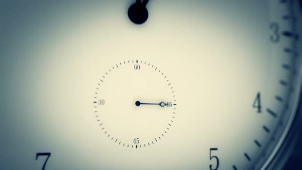 Time-lapse animation of a clock with the fast turning hand of clock ...