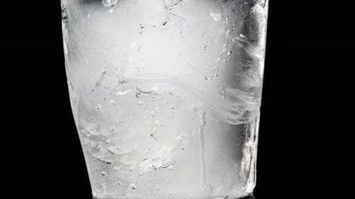 Close-up of Single Ice Cube Melting