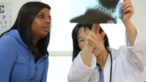 Doctor Explains Neck X-Ray to Patient