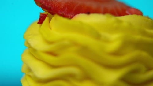 Cake with Yellow Frosting and Fruit Topping