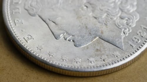 Rotating stock footage shot of antique American coins