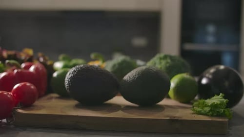 Fresh Vegetables Arranged on Cutting Board in Kitchen
