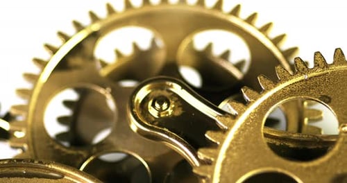 Gold Clockwork Gears Turning in Macro Shot