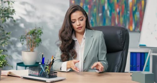 Sleek Bold Confident Woman Working in Office As Secretary Finishes Work Closes and Turns Off Latop