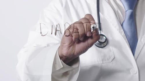 Asian Doctor Writing Diabetes