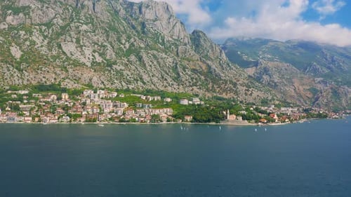 Aerial View of Huge Mountains and Small Town of Kotor Bay Montenegro