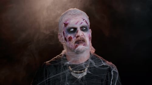 Scary Adult in Zombie Makeup with Snarl