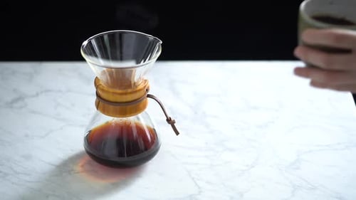 Pour Over Coffee and Cup on Marble Countertop