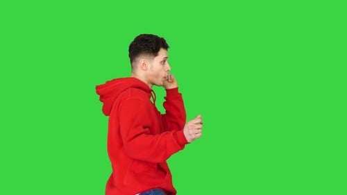 Young Hip-hop Man Break Dancing Top Break Dance on a Green Screen, Chroma Key