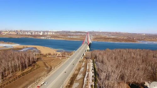 Spring Aerial Survey Drone Quadrocopter Flies Over the Road