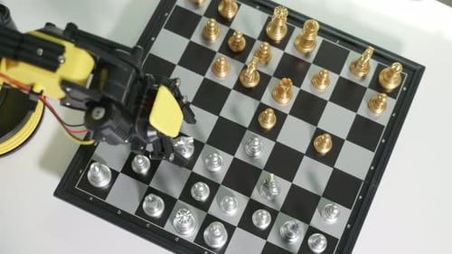 Robotic Arm Moves Chess Piece on Chessboard