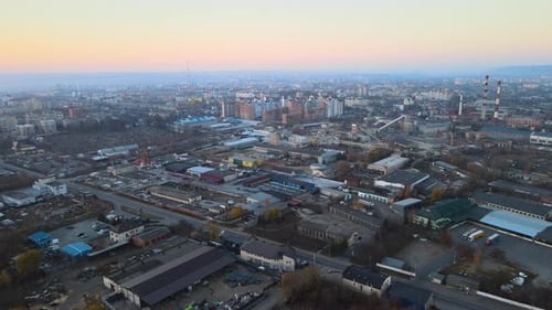 Aerial View of Goods Warehouses and Logistics Center in Industrial City Zone From Above