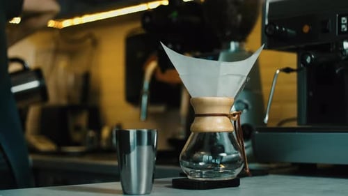 Process of making Filter coffee by spilling hot water through a layer of ground coffee