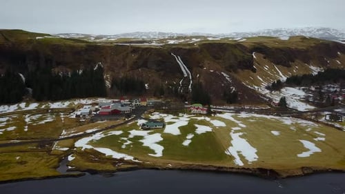 Aerial view of Icelandic countryside and village.