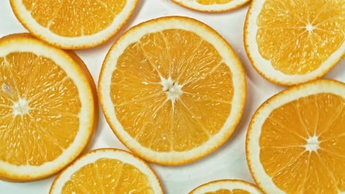 Macro Shot of Orange Fruit and rotate.Close Up Fresh Citrus Orange. Nature Background.