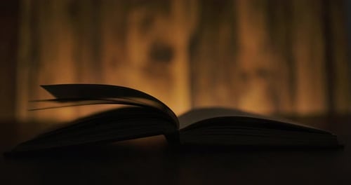 Pages Flipping in an Open Book Close Up