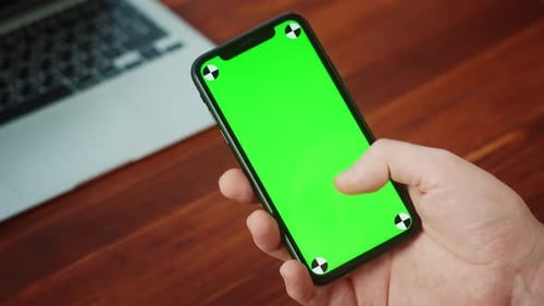 Businessman Using Smartphone with Chroma Key Closeup