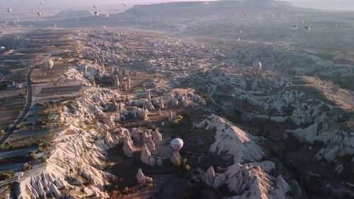 Drone Landscape From High Point of Unusual Valley with Limestone Mountains and Balloons in Sky