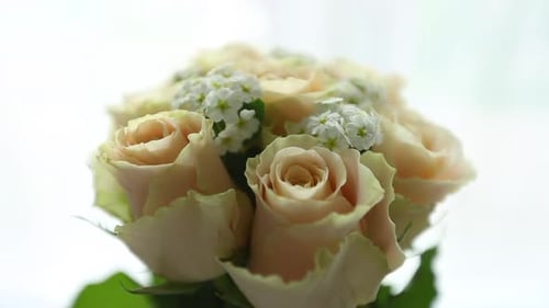 Close-Up of Peach Rose Wedding Bouquet