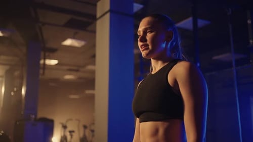 Fitness Healthy Woman Tired After Strength Training Exercise at Gym Resting Relaxing After Intense