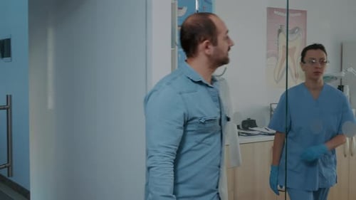 Man Enters Dentist Office For Appointment